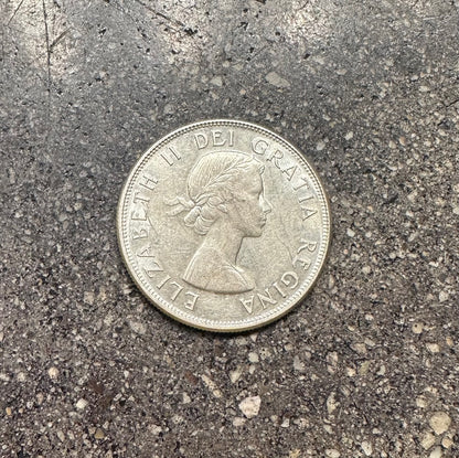 Canada 50 Cents Silver Coin (front) on a concrete background. - Mountainstruck Coin Jewelry