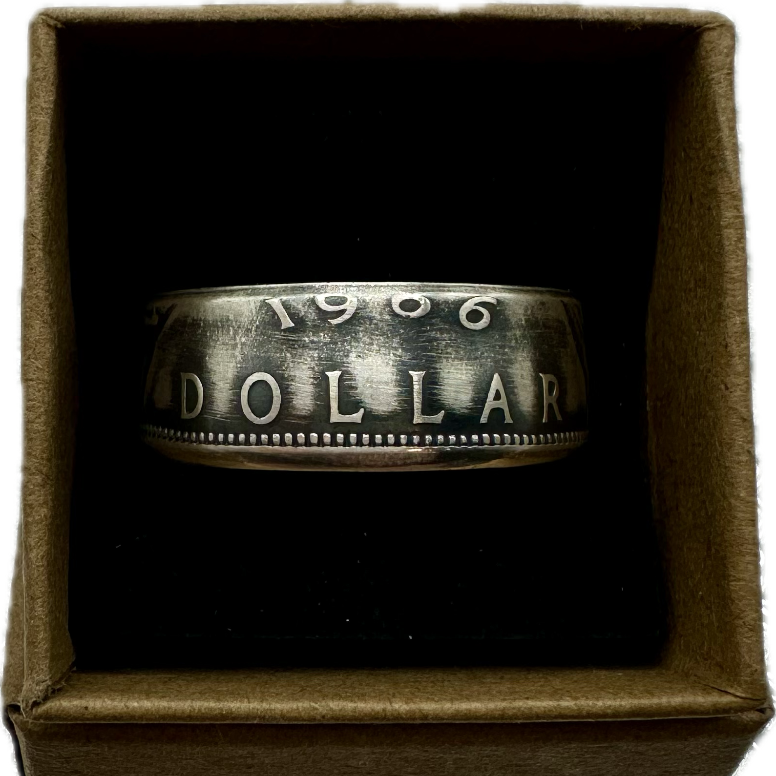 Canada Dollar Silver Coin Ring in a brown kraft box on a black velvet background. - Mountainstruck Coin Jewelry