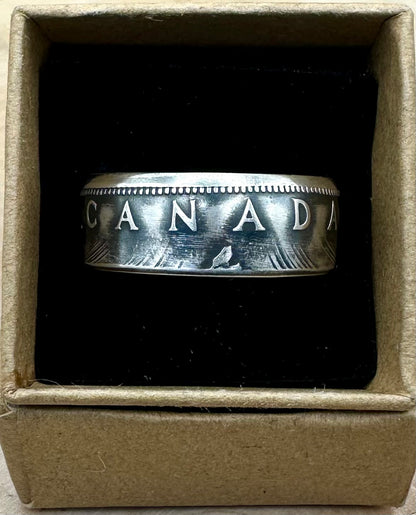Canada Dollar Silver Coin Ring in a brown kraft box on a black velvet background. - Mountainstruck Coin Jewelry