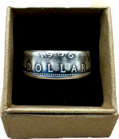 Canada Dollar Silver Coin Ring in a brown kraft box on a black velvet background. - Mountainstruck Coin Jewelry