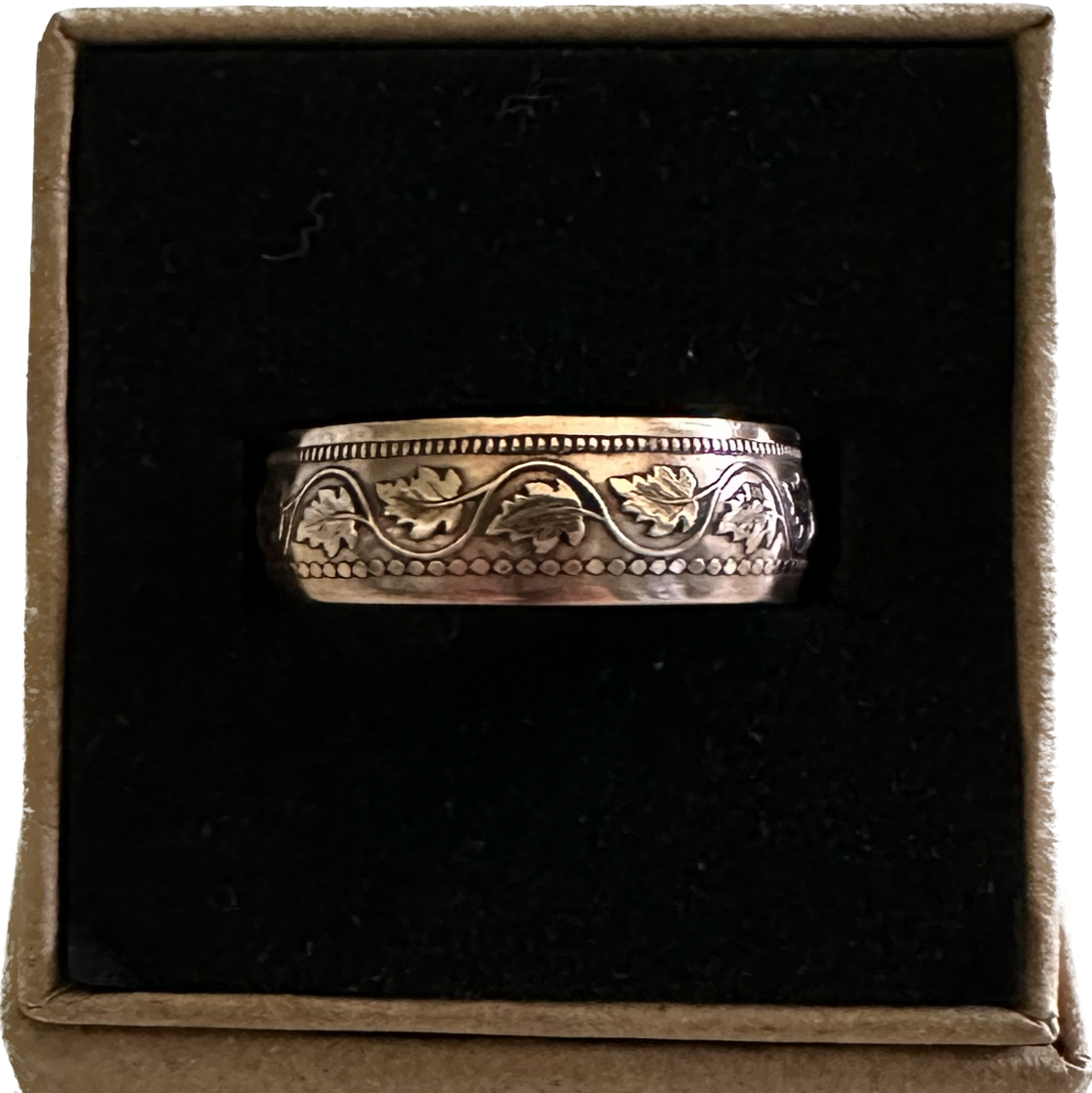 Canada Large Cent Leaf Coin Ring in a brown kraft box on a black velvet background. - Mountainstruck Coin Jewelry