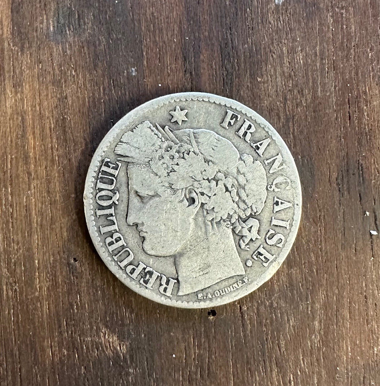 France 2 Franc Silver Coin front on a wood background. - Mountainstruck Coin Jewelry