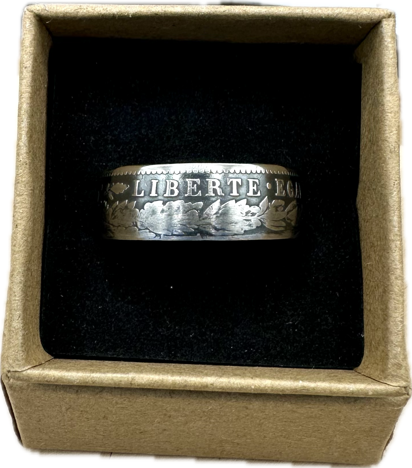 France 2 Franc Silver Coin Ring in a brown kraft box on a black velvet background. - Mountainstruck Coin Jewelry
