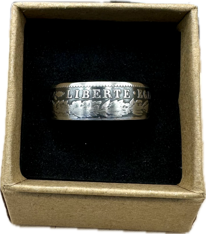 France 2 Franc Silver Coin Ring in a brown kraft box on a black velvet background. - Mountainstruck Coin Jewelry