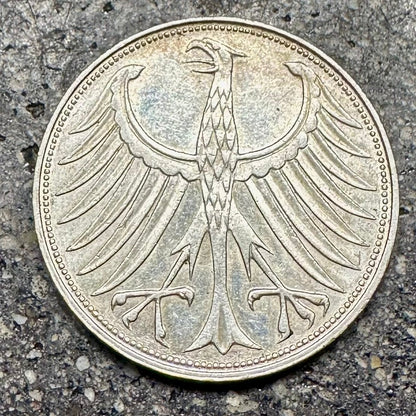 German Eagle 5 Mark Silver Coin on a concrete background. - Mountainstruck Coin Jewelry