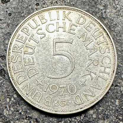German Eagle 5 Mark Silver Coin on a concrete background. - Mountainstruck Coin Jewelry