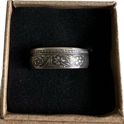 India Half Rupee Silver Coin Ring in a brown kraft box on a black velvet background. - Mountainstruck Coin Jewelry