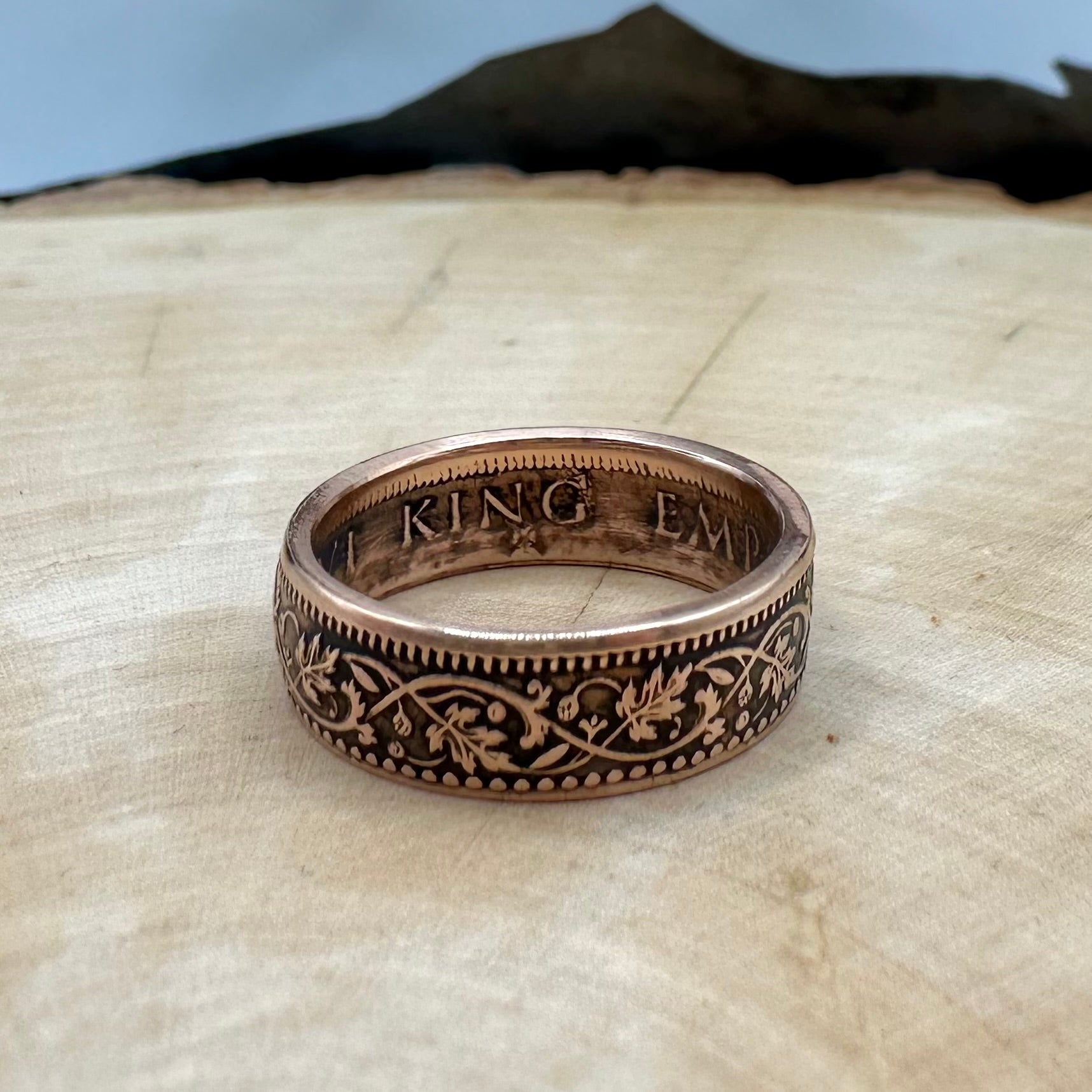 India Quarter Anna Coin Ring on a light wood round. - Mountainstruck Coin Jewelry