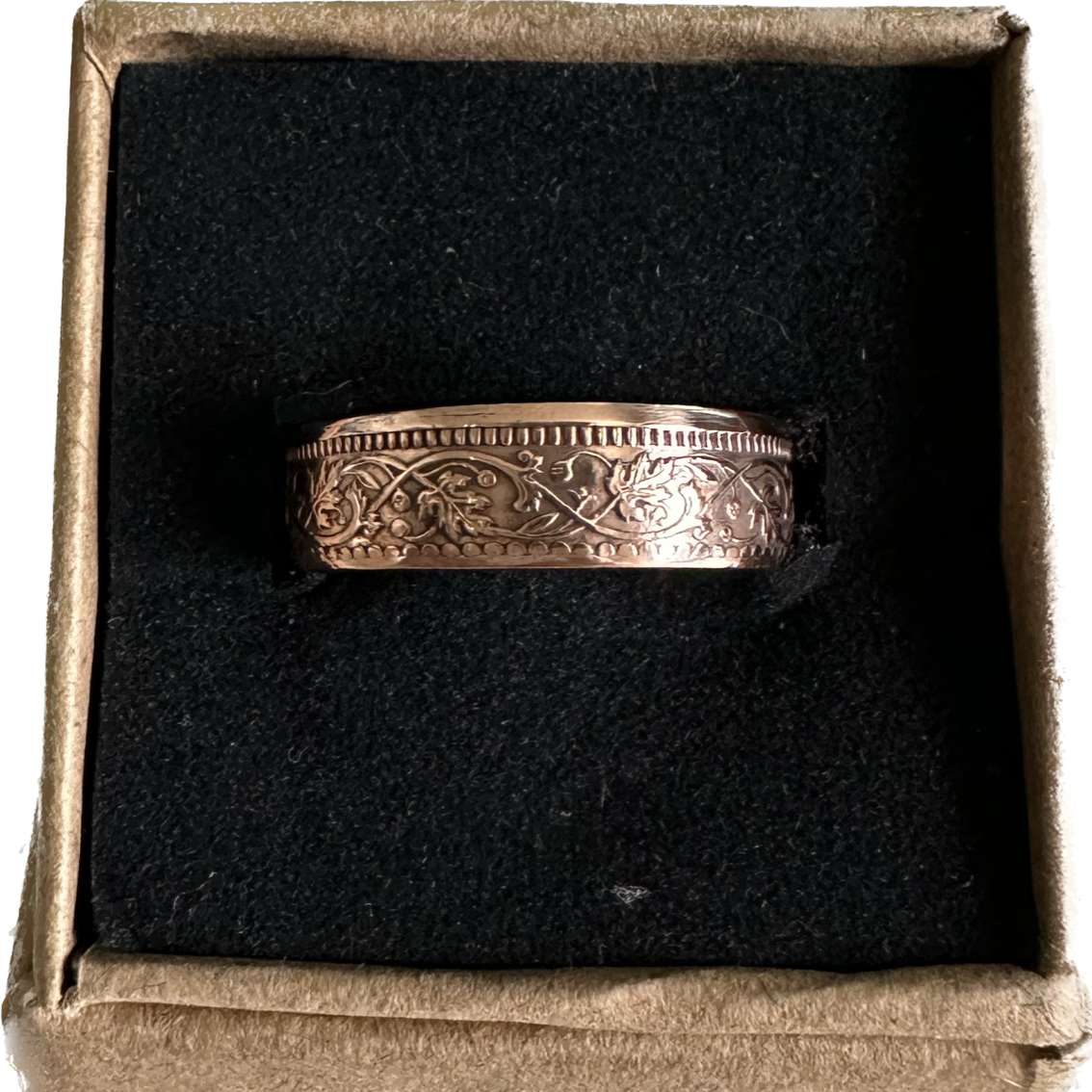 India Quarter Anna Coin Ring in a brown kraft box on a black velvet background. - Mountainstruck Coin Jewelry