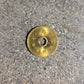 Japan 5 Yen Coin front on a concrete background. - Mountainstruck Coin Jewelry