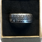 JFK Silver Half Dollar Coin Ring (reverse) in a brown kraft box on a black velvet background. - Mountainstruck Coin Jewelry