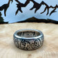 Mexico 1oz Libertad .999 Silver Coin Ring on a light wood round with a metal mountain background. - Mountainstruck Coin Jewelry