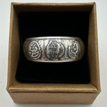 Mexico 1oz Libertad .999 Silver Coin Ring in a brown kraft box on a black velvet background. - Mountainstruck Coin Jewelry