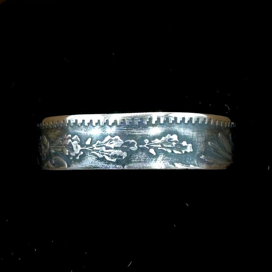 Mexico 50 Centavos Silver Coin Ring (Rare) in a brown kraft box on black velvet background.
- Mountainstruck Coin Jewelry