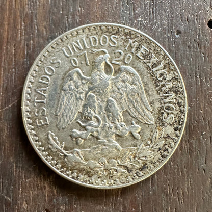 Mexico 50 Centavos Silver (Rare) Coin front on a concrete background. - Mountainstruck Coin Jewelry