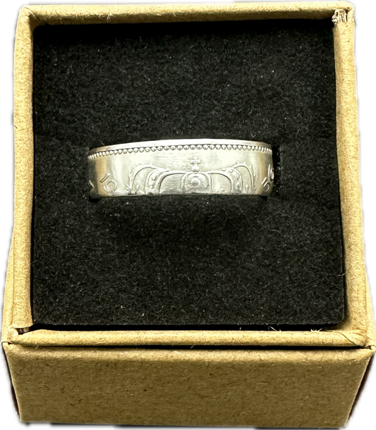Netherlands 1 Gulden Silver Coin Ring in brown kraft box on a black velvet background. - Mountainstruck Coin Jewelry