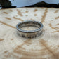 Netherlands 1 Gulden Silver Coin Ring  on a wood background. - Mountainstruck Coin Jewelry