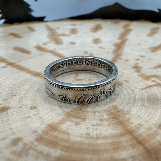 Netherlands 1 Gulden Silver Coin Ring  on a wood background. - Mountainstruck Coin Jewelry