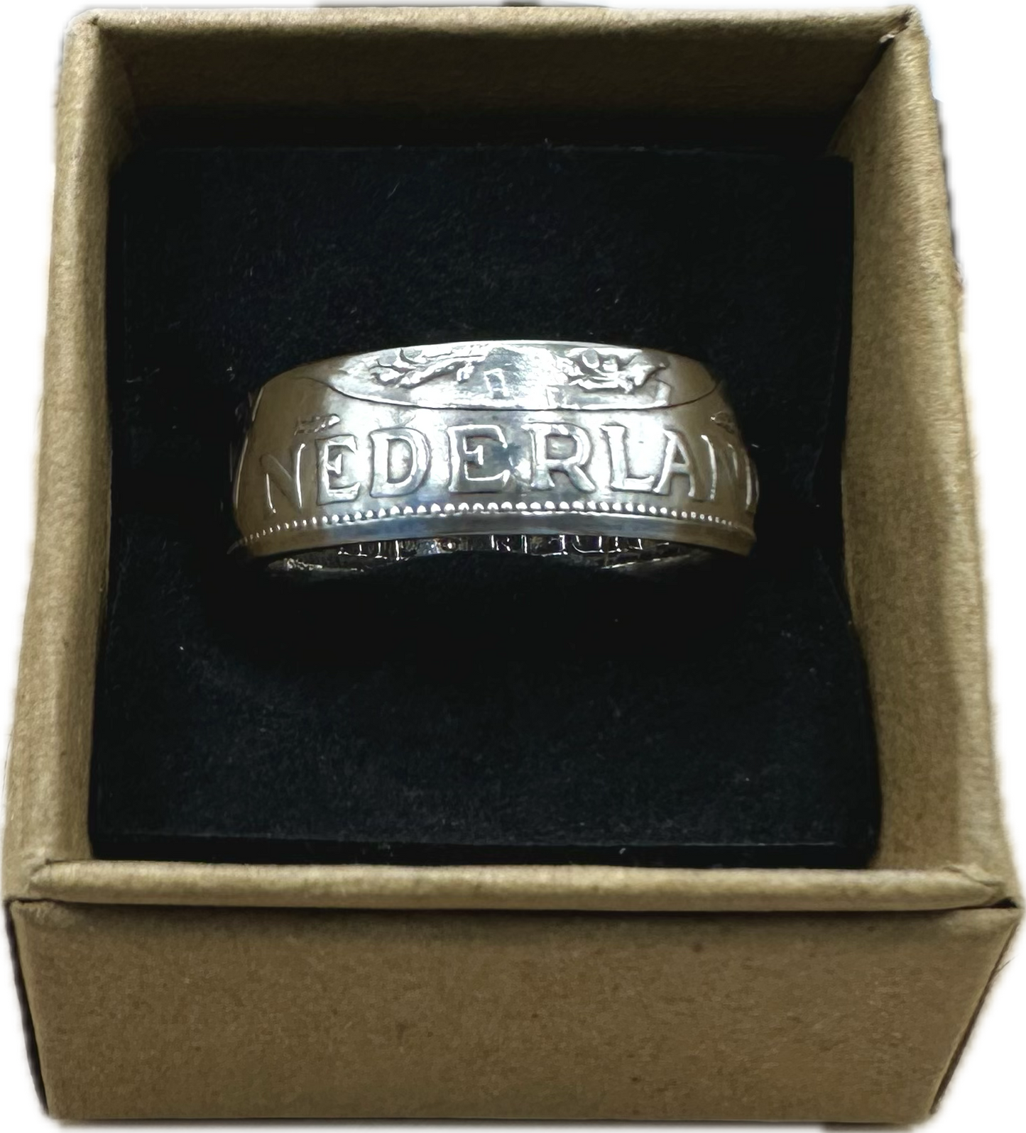 Netherlands 2.5 Gulden Silver Coin Ring in a brown kraft box on black velvet background. - Mountainstruck Coin Jewelry