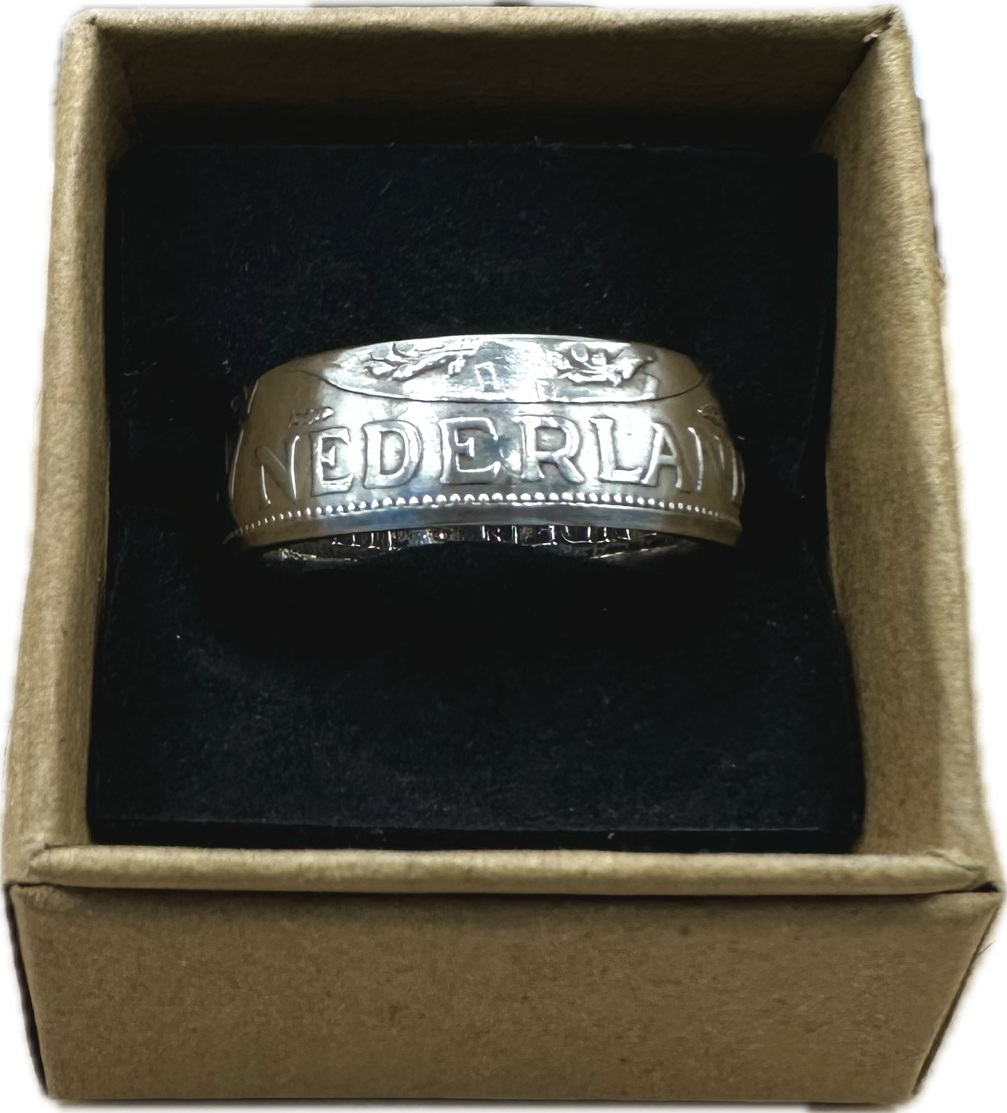 Netherlands 2.5 Gulden Silver Coin Ring in a brown kraft box on black velvet background. - Mountainstruck Coin Jewelry