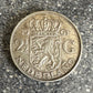 Netherlands 2.5 Gulden Silver Coin back on a concrete surface. - Mountainstruck Coin Jewelry
