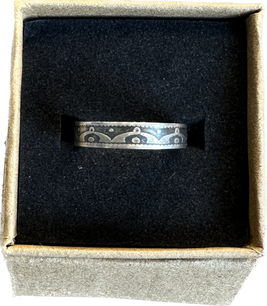 Newfoundland 10 Cents Silver Coin Ring in a brown kraft box on a black velvet background. - Mountainstruck Coin Jewelry