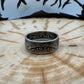 Seated Liberty Silver Half Dollar Coin Ring (patina) on a wood background. - Mountainstruck Coin Jewelry