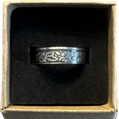 Swiss 1 Franc Silver Coin Ring in a brown craft box on a black velvet background. - Mountainstruck Coin Jewelry