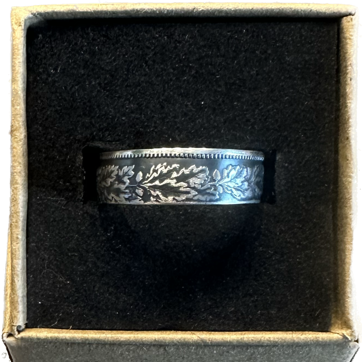 Swiss 1 Franc Silver Coin Ring in a brown craft box on a black velvet background. - Mountainstruck Coin Jewelry
