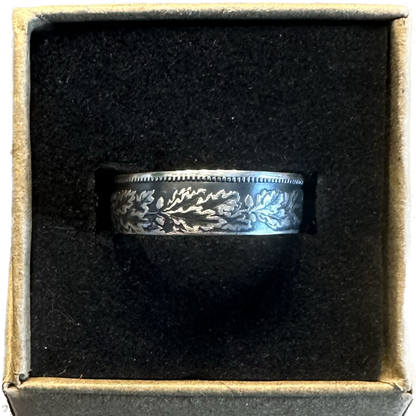 Swiss 1 Franc Silver Coin Ring in a brown craft box on a black velvet background. - Mountainstruck Coin Jewelry