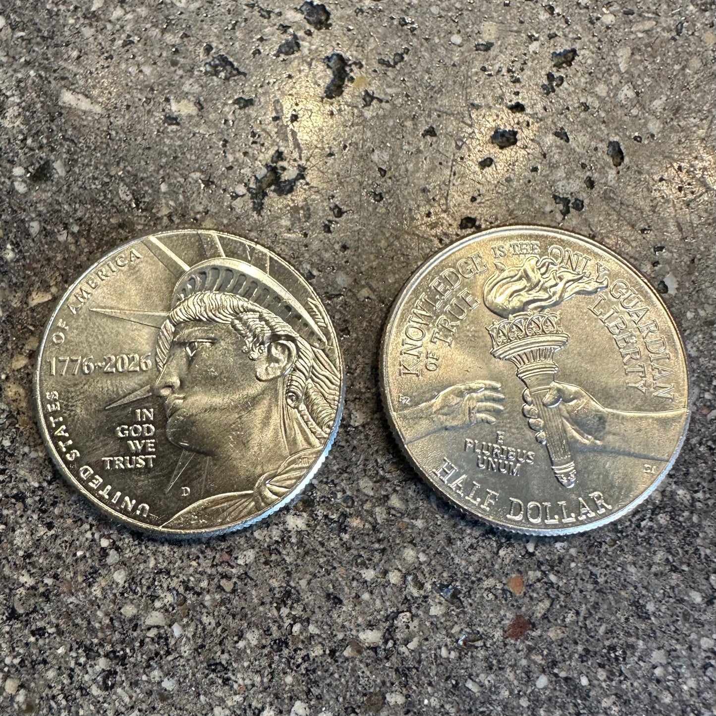 U.S. 2026 Half Dollar Coin on a dark concrete background. - Mountainstruck Coin Jewelry