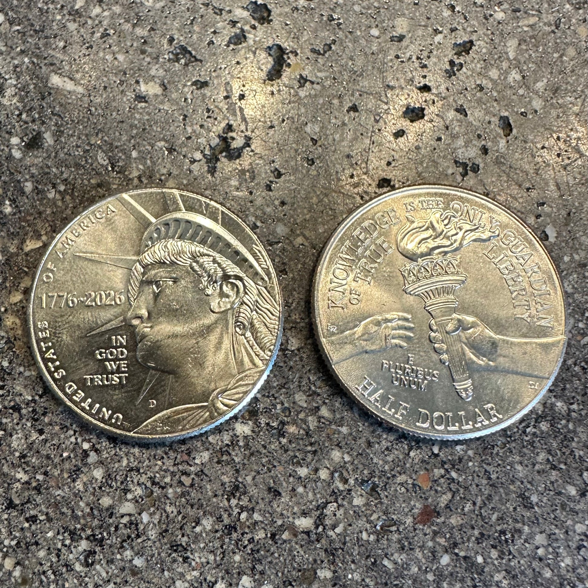U.S. 2026 Half Dollar Coin on a dark concrete background. - Mountainstruck Coin Jewelry