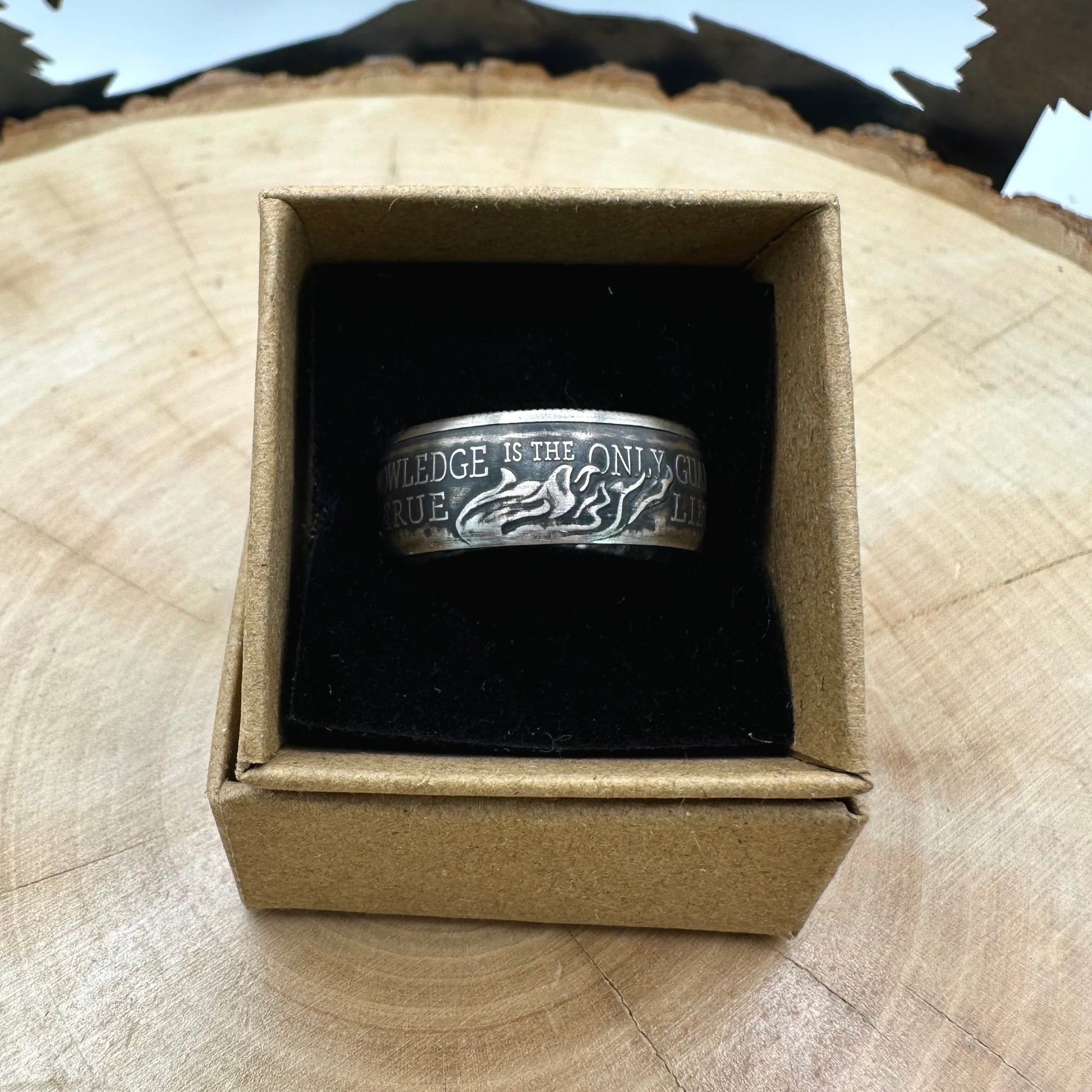 U.S. 2026 Half Dollar Coin Ring on a black velvet background in a brown kraft box on a wood round. - Mountainstruck Coin Jewelry
