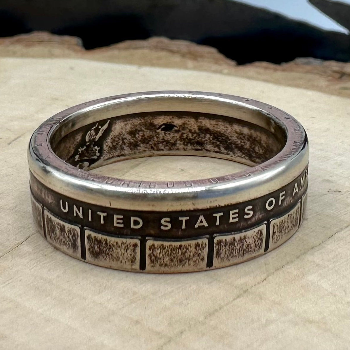 U.S. 2026 "CRAY-1 Supercomputer" 1 Dollar Coin Ring on a wood round. - Mountainstruck Coin Jewelry