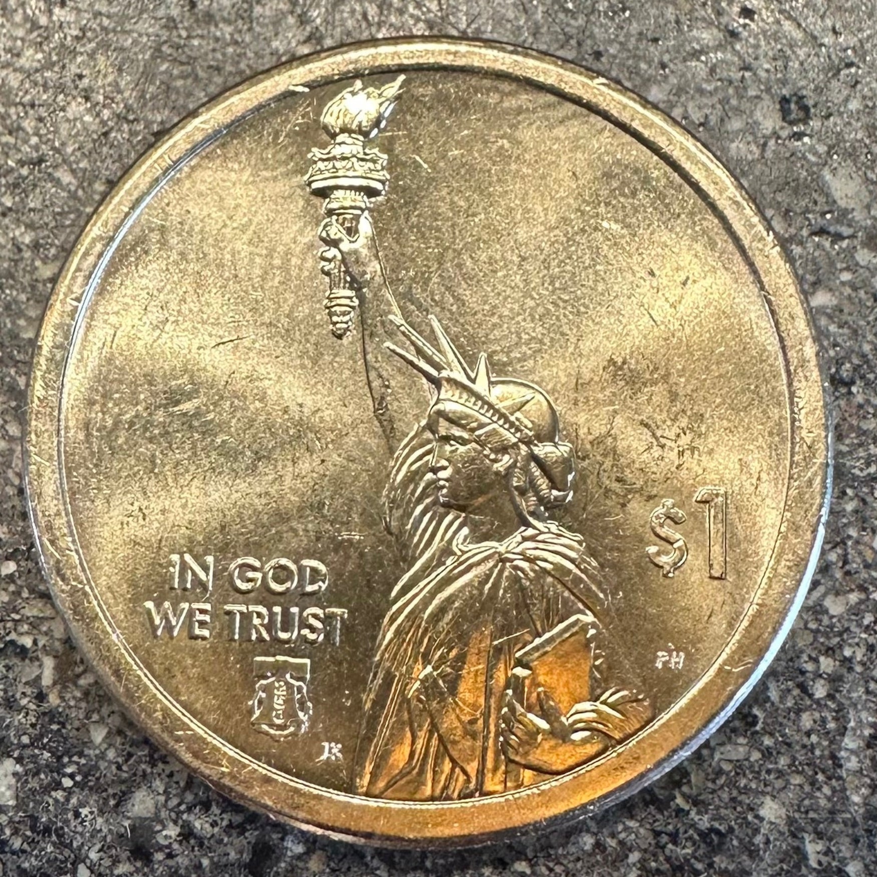 U.S. 2026 "CRAY-1 Supercomputer" 1 Dollar Coin on a concrete background. - Mountainstruck Coin Jewelry