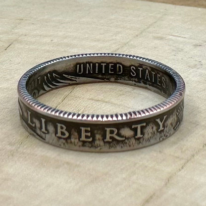 U.S. 2026 "Emerging Liberty" Dime Coin Ring on a wood round. - Mountainstruck Coin Jewelry