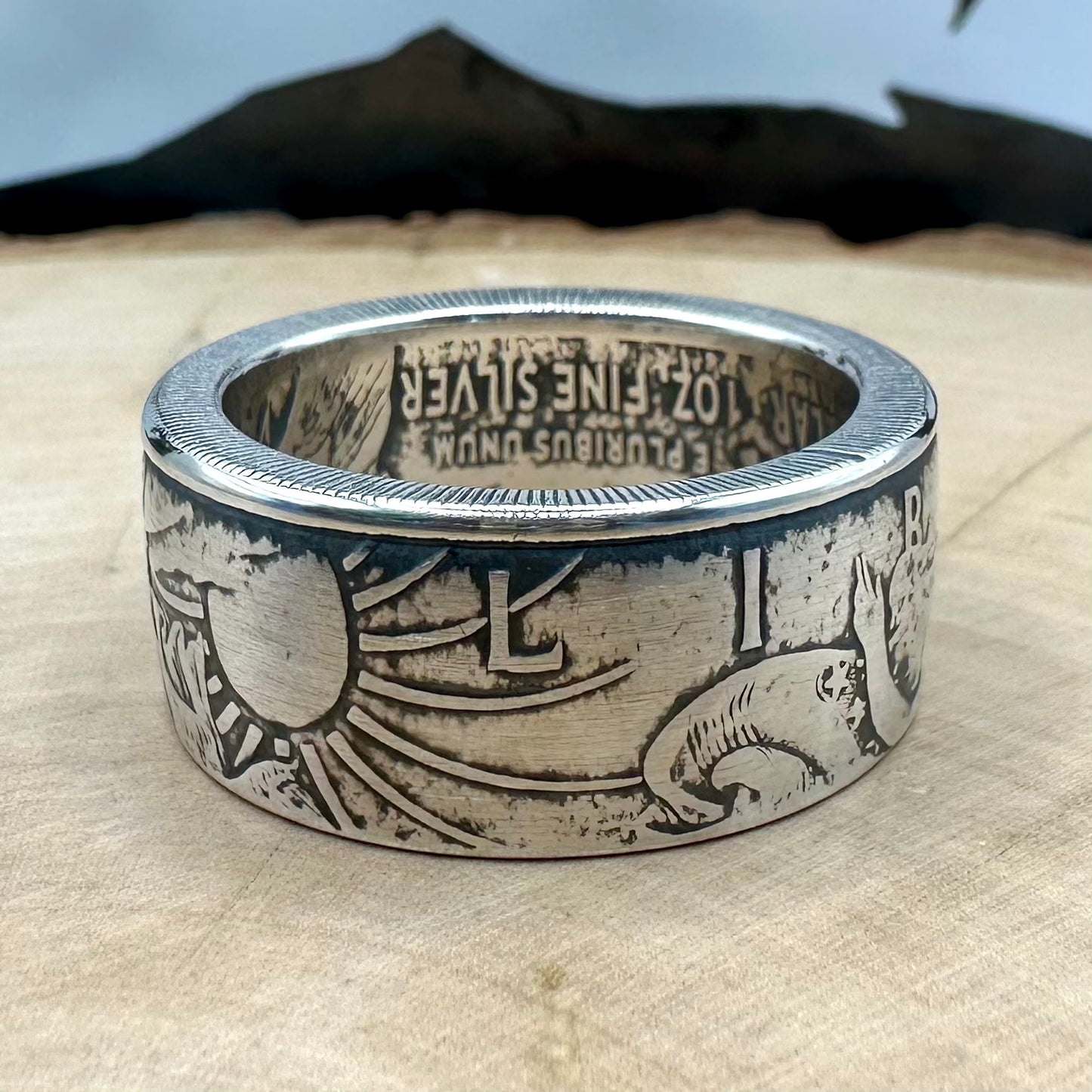 U.S. 2026 1oz 999 Silver Eagle $1 Coin Ring on a wood round. - Mountainstruck Coin Jewelry