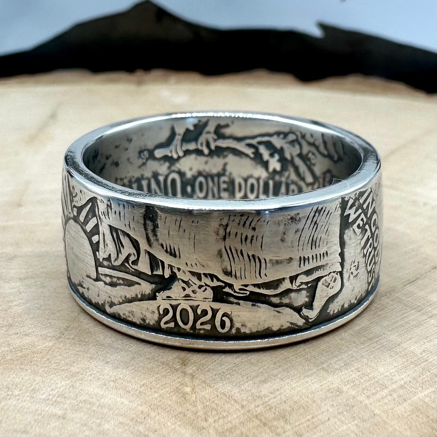 U.S. 2026 1oz 999 Silver Eagle $1 Coin Ring on a wood round. - Mountainstruck Coin Jewelry