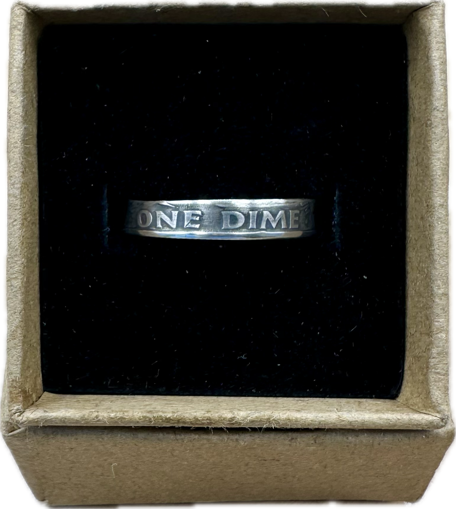 U.S. Dime Silver Coin Ring patina in a brown craft box on a black velvet background. - Mountainstruck Coin Jewelry