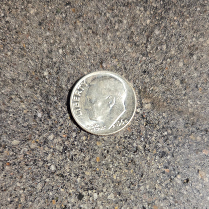 U.S. Dime Silver Coin front on concrete background. - Mountainstruck Coin Jewelry