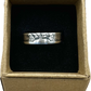 U.S. Standing Liberty Quarter Silver Coin Ring in a brown kraft box on a black velvet background. - Mountainstruck Coin Jewelry