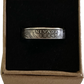 U.S. State Quarter Silver Coin Ring
featuring Nevada in a brown kraft box on a black velvet background. - Mountainstruck Coin Jewelry
