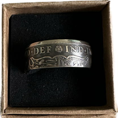 UK Half Crown Silver Coin Ring (1927-1936, G.B.) in a brown kraft box on a black velvet background. - Mountainstruck Coin Jewelry