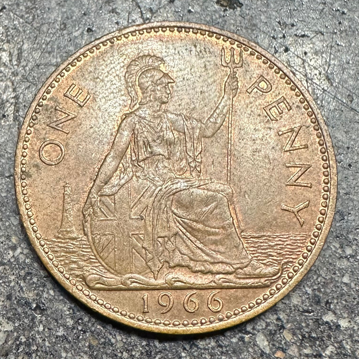 UK One Penny Coin on a concrete background.  - Mountainstruck Coin Jewelry