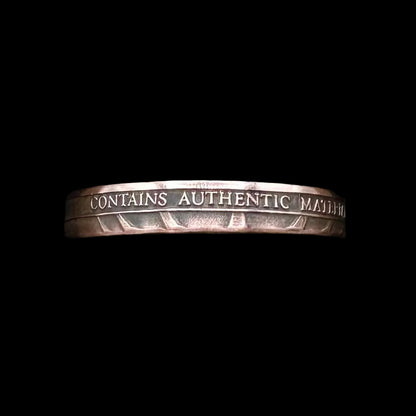U.S. Authentic Copper Statue of Liberty Token Ring in a brown kraft box on a black velvet background. - Mountainstruck Coin Jewelry
