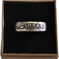 U.S. Seated Liberty Quarter Silver Coin Ring in a black velvet background in a brown kraft box. 
- Mountainstruck Coin Jewelry