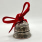 2025 Holiday Coin Bell Ornament Works! with a red bow on a white background. - Mountainstruck Coin Jewelry