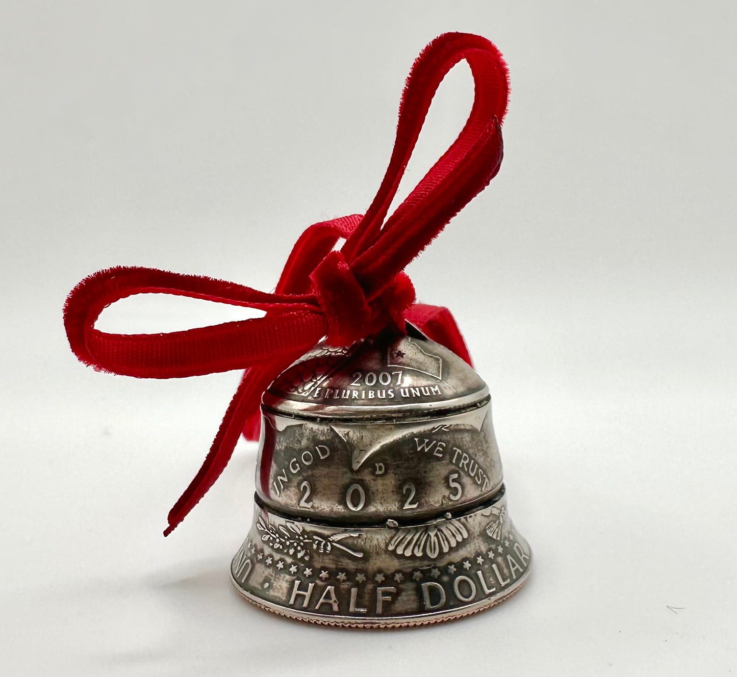 2025 Holiday Coin Bell Ornament Works! with a red bow on a white background. - Mountainstruck Coin Jewelry