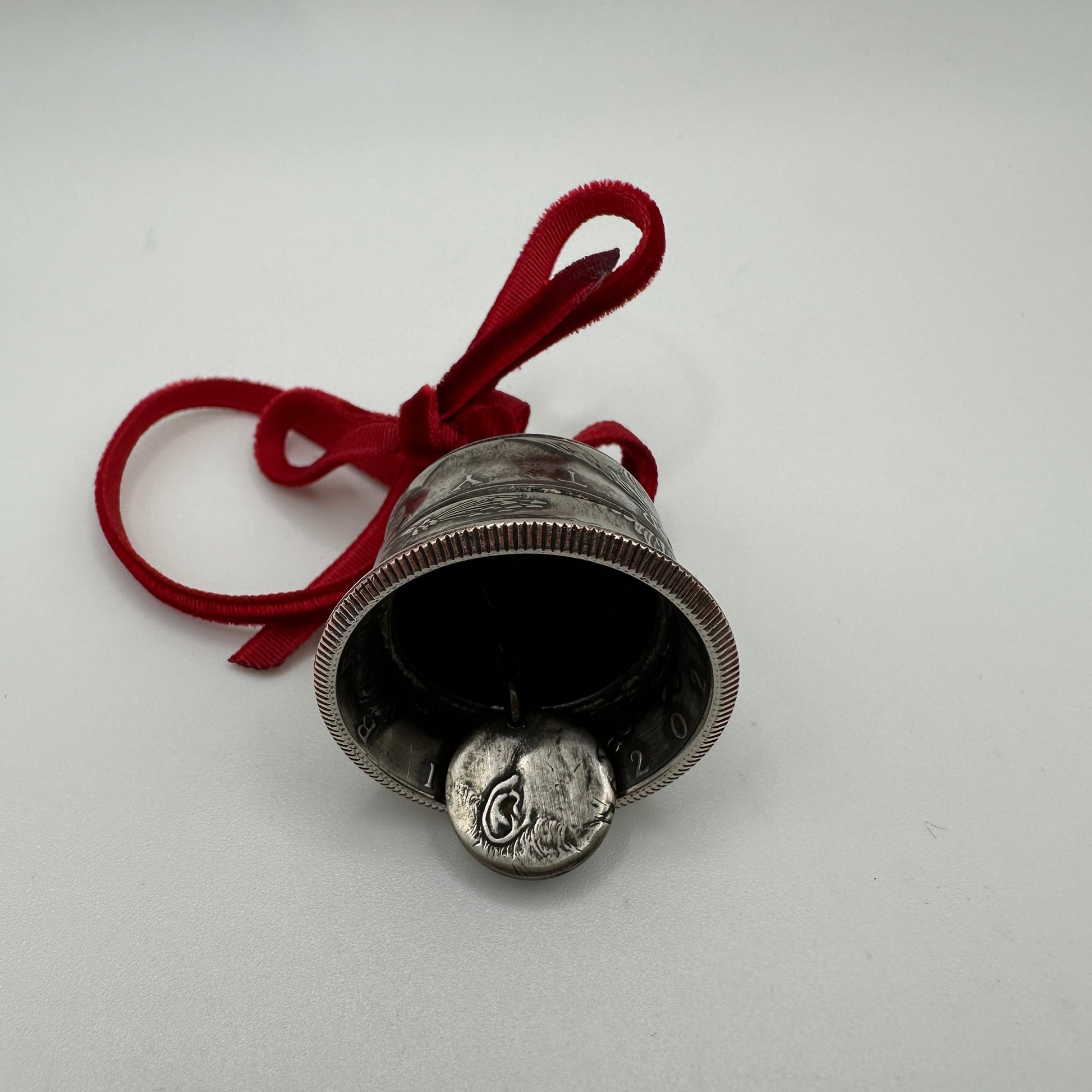 2025 Holiday Coin Bell Ornament Works! with a red bow on a white background. - Mountainstruck Coin Jewelry