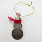 2025 Snowman Coin Christmas Ornament with a selection of U.S. coins (penny, dime, state quarter, and 2025 uncirculated half dollar) soldered into a snowman with a red ribbon scarf and golden tassel on a white background. - Mountainstruck Coin Jewelry